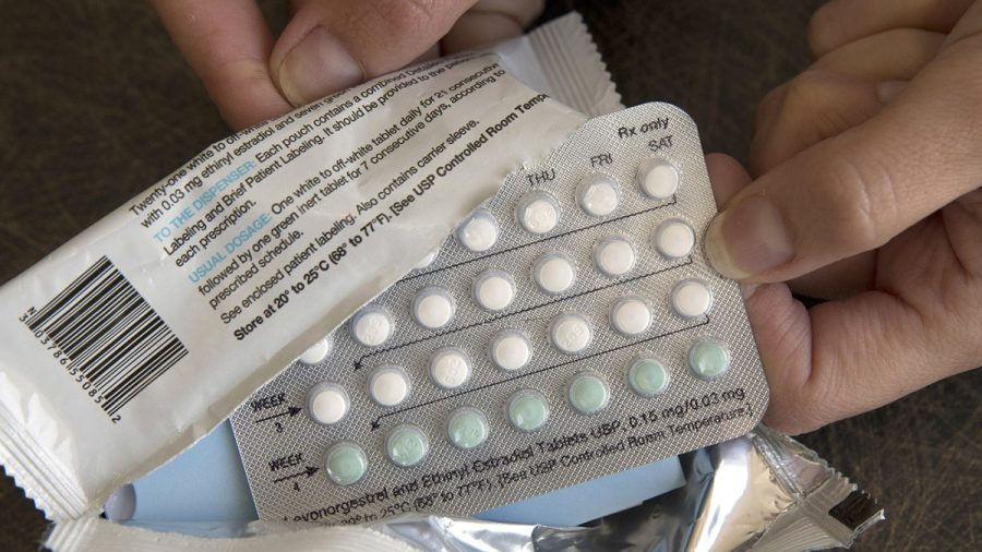 FILE - A one-month dosage of hormonal birth control pills is displayed in Sacramento, Calif., Aug. 26, 2016. A drug company is seeking U.S. approval for the first-ever birth control pill that women could buy without a prescription. The request from a French drugmaker sets up a high-stakes decision for the Food and Drug Administration amid the political fallout from the Supreme Court's recent decision overturning Roe v. Wade. (AP Photo/Rich Pedroncelli, File)