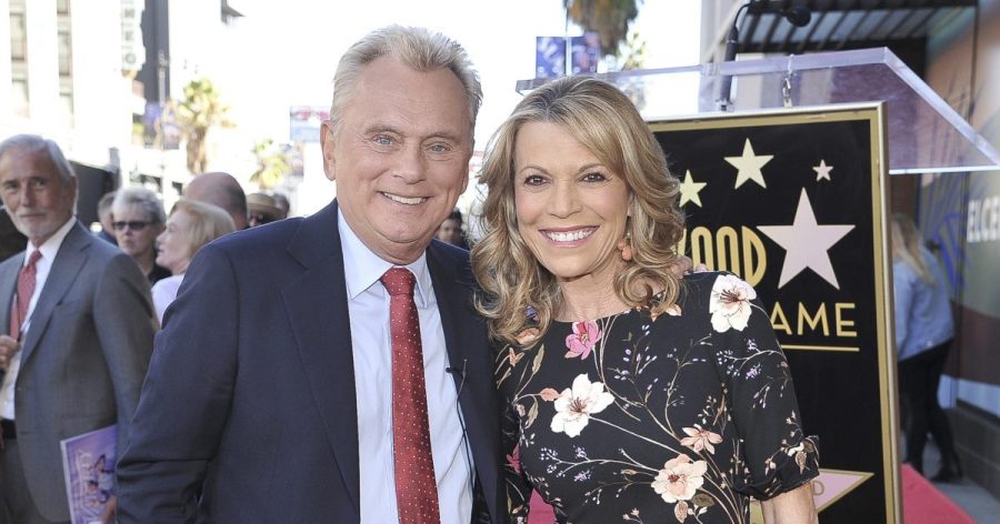 Pat Sajak, left, and Vanna White, from "Wheel of Fortune," attend a ceremony honoring Harry Friedman with a star on the Hollywood Walk of Fame in Los Angeles on Nov. 1, 2019. (Photo by Richard Shotwell/Invision/AP, File)